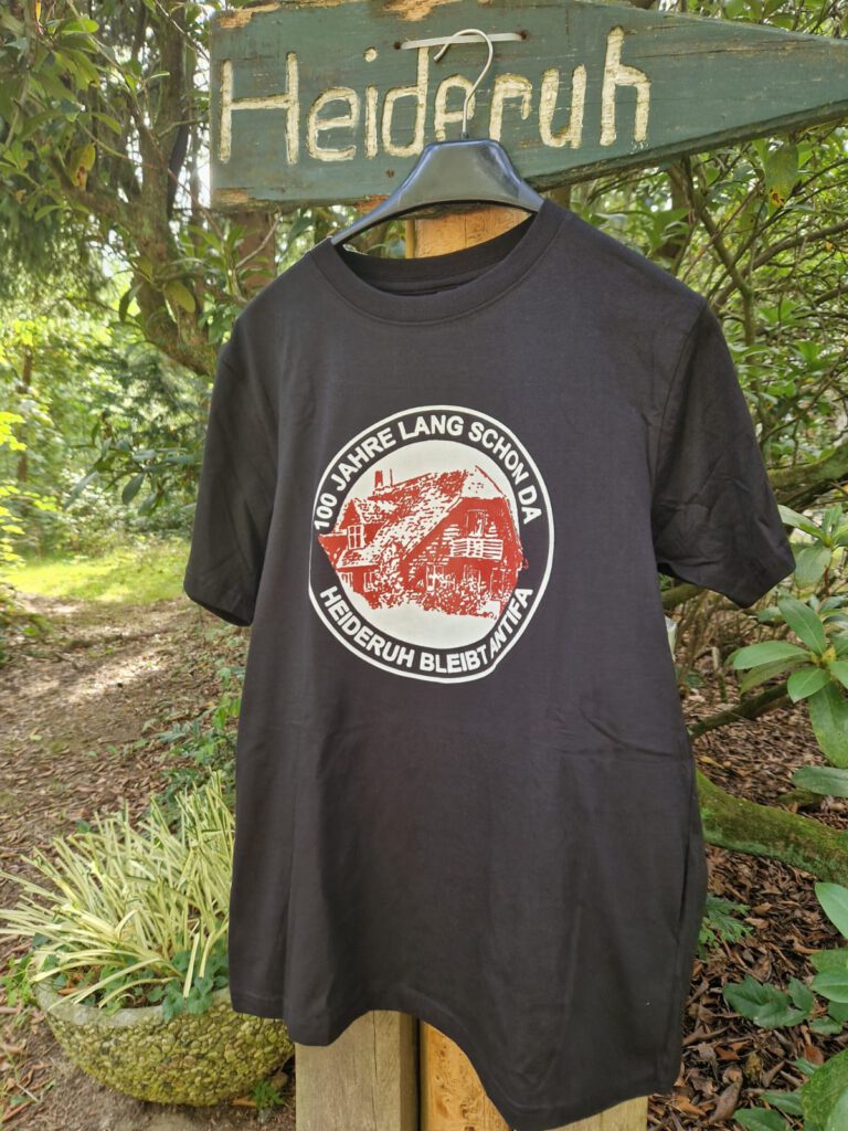 Heideruh T-Shirt "100 Jahre lang schon da. Heideruh bleibt Antifa."